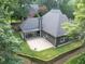 An aerial view of the backyard featuring a patio and covered space at 3365 Sweetwater Dr, Cumming, GA 30041