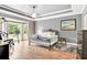 Comfortable bedroom with large bay window and a fitness machine for a relaxing and healthy lifestyle at 3365 Sweetwater Dr, Cumming, GA 30041