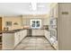 Well-equipped kitchen with stainless steel appliances, granite countertops, and tile flooring at 3365 Sweetwater Dr, Cumming, GA 30041