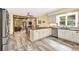 This kitchen features stainless steel appliances, granite countertops, and a breakfast bar at 3365 Sweetwater Dr, Cumming, GA 30041