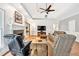 Cozy living room featuring a fireplace, wood floors, and tray ceiling detail at 3365 Sweetwater Dr, Cumming, GA 30041