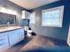 Bathroom featuring tile floors, modern vanity with basin sink, and neutral paint at 3460 Ebenezer Rd, Marietta, GA 30066