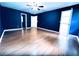 Bedroom with hardwood floors, ceiling fan, and ensuite bathroom at 3460 Ebenezer Rd, Marietta, GA 30066
