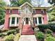 Attractive brick home featuring stone accents, bay windows, and a welcoming front entrance at 3460 Ebenezer Rd, Marietta, GA 30066