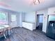 Bright and airy kitchen with granite counters, dining area, and access to the deck at 3460 Ebenezer Rd, Marietta, GA 30066