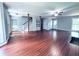 Open-concept living room boasts wood floors, built-in shelves, and a cozy atmosphere at 3460 Ebenezer Rd, Marietta, GA 30066
