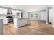 Modern, open-concept kitchen features stainless steel appliances, granite countertops, and a breakfast bar at 2621 Walton Sw Way, Marietta, GA 30060