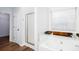 A bright bathroom features a soaking tub with jets and a separate glass-enclosed shower at 264 Ascott Ln, Woodstock, GA 30189
