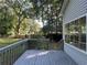 Back deck overlooking the treed lot and playground set at 4720 Fowler Cir, Acworth, GA 30101