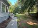This backyard features a patio, swing set, storage shed, and wooden fence at 4720 Fowler Cir, Acworth, GA 30101