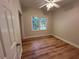 Comfortable bedroom featuring a window and ceiling fan, perfect for relaxing and unwinding at 4720 Fowler Cir, Acworth, GA 30101