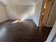 Bedroom featuring hardwood floors and an entry to the bathroom at 4720 Fowler Cir, Acworth, GA 30101