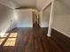Bright bedroom boasts hardwood floors, neutral paint, and natural light at 4720 Fowler Cir, Acworth, GA 30101