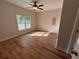 Bright bedroom with hardwood floors and a window at 4720 Fowler Cir, Acworth, GA 30101