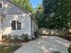 A paved driveway sits beside this cozy home at 4720 Fowler Cir, Acworth, GA 30101