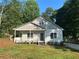 Charming one-story home with a well-manicured lawn and a long driveway at 4720 Fowler Cir, Acworth, GA 30101