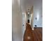 Hallway featuring hardwood floors and neutral paint at 4720 Fowler Cir, Acworth, GA 30101