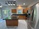 Bright kitchen featuring granite countertops, stainless steel appliances, and a functional center island at 4720 Fowler Cir, Acworth, GA 30101