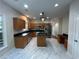 Spacious kitchen with stainless steel appliances, granite countertops, and a large island at 4720 Fowler Cir, Acworth, GA 30101