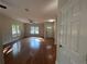 Inviting living room featuring beautiful hardwood floors and a ceiling fan with natural light at 4720 Fowler Cir, Acworth, GA 30101
