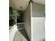 A white porch with ceiling fan detail at 4720 Fowler Cir, Acworth, GA 30101
