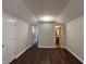 The room offers hardwood floors, access to two rooms, and neutral paint at 4720 Fowler Cir, Acworth, GA 30101