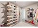 Walk-in closet with shoe racks and shelves, offering an abundance of storage solutions at 4992 Lower Elm St, Atlanta, GA 30349