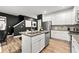 Stylish kitchen with granite countertops, stainless steel appliances, and white cabinetry at 4992 Lower Elm St, Atlanta, GA 30349