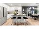 Modern kitchen featuring stainless steel appliances, granite counters, and a convenient center island with bar seating at 4992 Lower Elm St, Atlanta, GA 30349