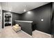 Upstairs landing area with a beige cushioned bench at 4992 Lower Elm St, Atlanta, GA 30349