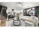 Bright, open living space featuring a modern kitchen and dining area, perfect for entertaining at 4992 Lower Elm St, Atlanta, GA 30349