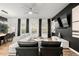 Bright living space featuring modern decor, comfortable seating, and large windows that fill the area with natural light at 4992 Lower Elm St, Atlanta, GA 30349