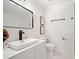 Modern bathroom features a vessel sink, sleek faucet, and stylish wall-mounted mirror and accessories at , Atlanta, GA 30344