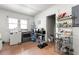 Kitchen area with appliances, shelving units, and tile flooring at 1639 Rogers Sw Ave, Atlanta, GA 30310