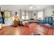 Spacious living room with hardwood floors, natural light, and neutral decor at 1639 Rogers Sw Ave, Atlanta, GA 30310