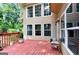 Cozy back deck with wooded views, perfect for relaxing and enjoying the natural scenery at 4335 Burgomeister Pl, Snellville, GA 30039