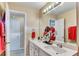 Bathroom featuring a double vanity, and a large mirror at 4335 Burgomeister Pl, Snellville, GA 30039