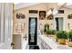 Bathroom with dual sinks, a soaking tub, and stylish decor at 4335 Burgomeister Pl, Snellville, GA 30039