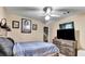 Cozy bedroom featuring a ceiling fan and natural light at 4335 Burgomeister Pl, Snellville, GA 30039