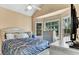 Bright bedroom with lots of windows and a ceiling fan at 4335 Burgomeister Pl, Snellville, GA 30039