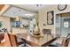 Open-concept dining room with adjacent kitchen area at 4335 Burgomeister Pl, Snellville, GA 30039