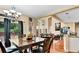 Dining room filled with natural light and hardwood floors at 4335 Burgomeister Pl, Snellville, GA 30039