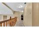 Upstairs hallway showcasing carpeted floors and natural lighting at 4335 Burgomeister Pl, Snellville, GA 30039