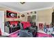 Comfortable living room features recliners and sports memorabilia, perfect for relaxation and entertainment at 4335 Burgomeister Pl, Snellville, GA 30039