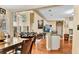 Open-concept living space with hardwood floors, high ceilings, and abundant natural light at 4335 Burgomeister Pl, Snellville, GA 30039