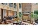 Living room showcasing a stone fireplace, ceiling fan, and comfortable seating area at 4335 Burgomeister Pl, Snellville, GA 30039
