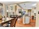 Spacious living room area with hardwood floors, natural light and a view into the dining room at 4335 Burgomeister Pl, Snellville, GA 30039