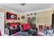 Living room with recliners and a view to the fenced backyard at 4335 Burgomeister Pl, Snellville, GA 30039