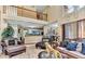 Cozy living room with a glimpse of the kitchen in the background at 4335 Burgomeister Pl, Snellville, GA 30039