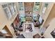 Bright living room with stone fireplace, multiple windows, and stylish furnishings at 4335 Burgomeister Pl, Snellville, GA 30039